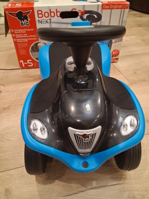 BIG Jeździk Next Blue z Klaksonem i Światłami Po zwrocie