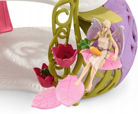 Schleich Błyszczący domek z kwiatami z jednorożcami, jeziorem i stajnią POWYSTAWOWY